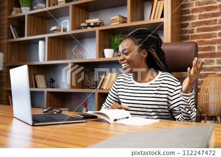 Woman Enjoying Video Call While Working From Home 112247472