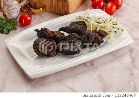 Grilled beef barbecue served onion 112248467