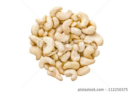 Cashew nuts, piled in a round pile, isolated on white background with clipping path Cashew nuts, piled in a round pile, isolated on white background with clipping path 112250375