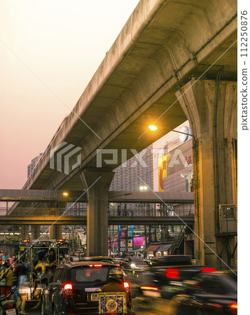 Main road at dusk on the outskirts of Bangkok, Thailand / Samut Prakarn, Thailand Main road at dusk on the outskirts of Bangkok, Thailand / Samut Prakarn, Thailand 112250876