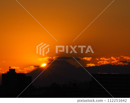 Sun setting over Mt. Fuji Sun setting over Mt. Fuji 112251642