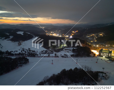 Aerial top view of Ski resort with snow mountain, sport recreation in winter season. 112252567
