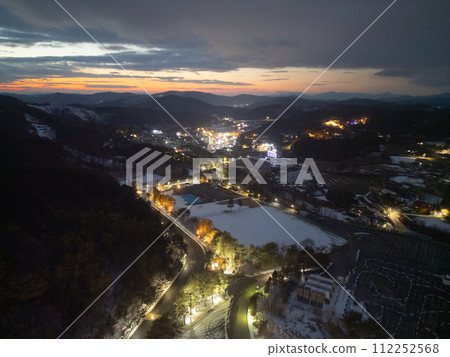 Aerial top view of Ski resort with snow mountain, sport recreation in winter season. 112252568
