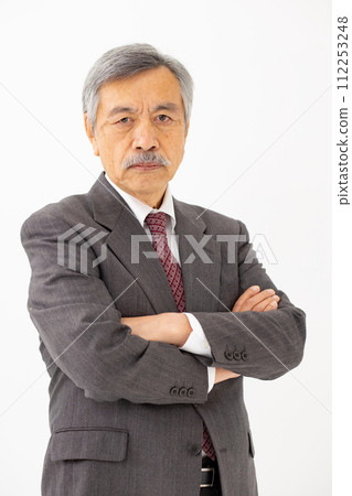 Senior male business arms crossed Senior male business arms crossed 112253248