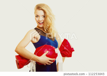 holidays love happiness concept - girl with red gift 112253843