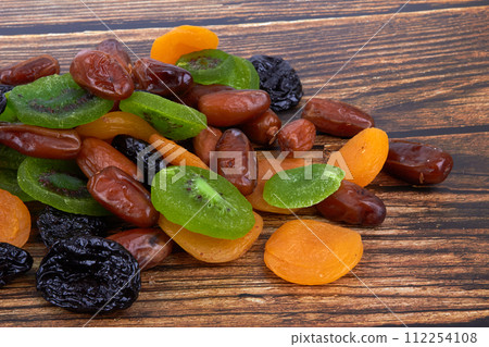 Dry fruits on wood Dry fruits on wood 112254108