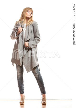 blonde elegant woman in gray coat. blonde elegant woman in gray coat. 112254267