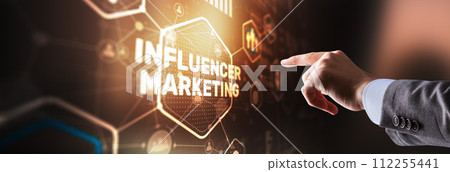 Man clicks on the inscription INFLUENCER MARKETING 112255441