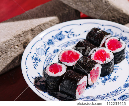 sushi maki rolls with tuna inside on stone brick sushi maki rolls with tuna inside on stone brick 112255613