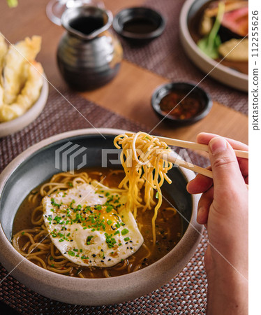 Kimchi noodle spicy soup with egg Kimchi noodle spicy soup with egg 112255626