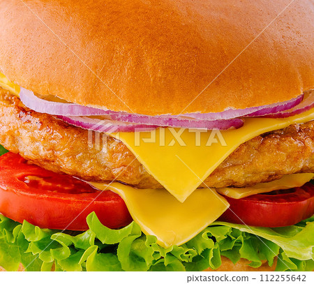 Big hamburger with chicken cutlet closeup Big hamburger with chicken cutlet closeup 112255642