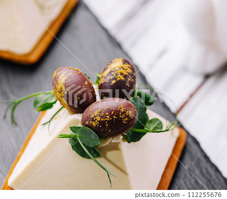 dessert souffle cookies with chocolate Easter eggs dessert souffle cookies with chocolate Easter eggs 112255676