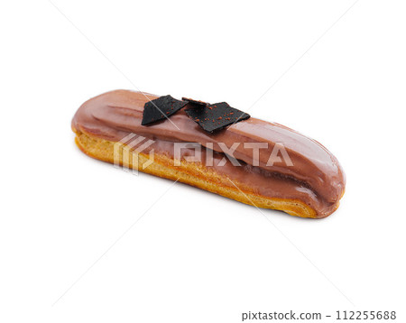 Eclair topped with chocolate on white background 112255688