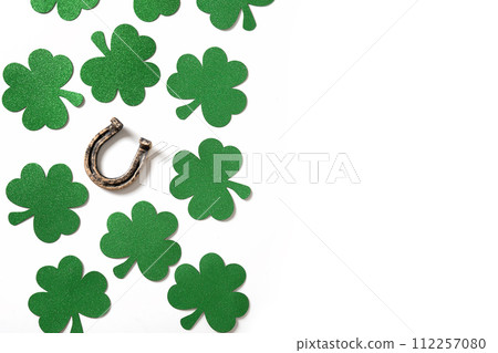 St. Patrick's day banner with clover leaves and horseshoe on white. St. Patrick's day banner with clover leaves and horseshoe on white. 112257080