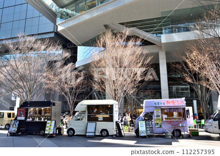 A food truck set up in the Tokyo International Forum courtyard during lunch time A food truck set up in the Tokyo International Forum courtyard during lunch time 112257395