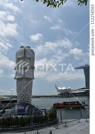 Merlion and Marina Bay Sands from behind at Merlion Park in Singapore Merlion and Marina Bay Sands from behind at Merlion Park in Singapore 112258563