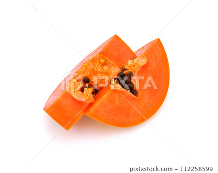 cut ripe papaya with seeds on white background 112258599