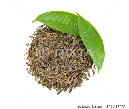Top view of Green tea leaves with dried tea leaves isolated on white background. 112258681