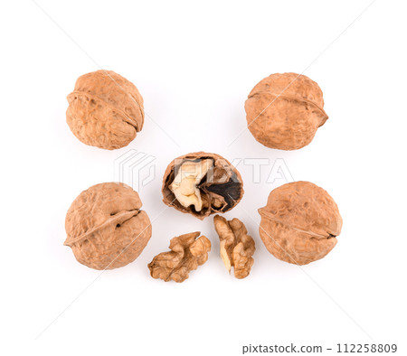 Top view of Walnuts on white background 112258809