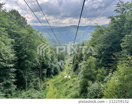 Cable car in the mountains in summer. Carpathians, Ukraine 112259132