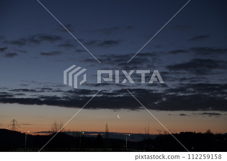 The morning star and the dawn moon rising in the dawn sky 112259158