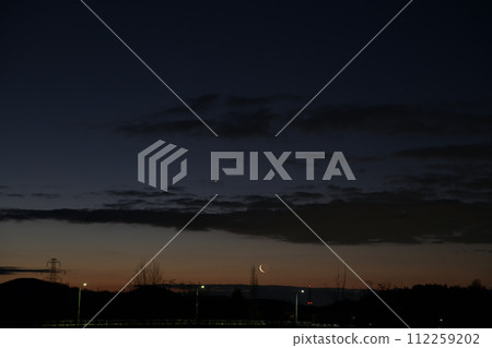 The morning star and the dawn moon rising in the dawn sky 112259202