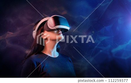 Woman with VR virtual reality goggles Woman with VR virtual reality goggles 112259377