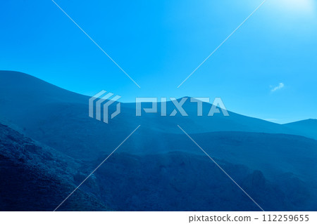 Silhouette of mountains in blue colors 112259655
