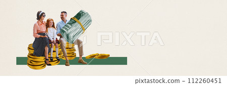 Happy family, man, woman and little girl sitting on coins stack with man holding many paper money. Financial growth and success 112260451