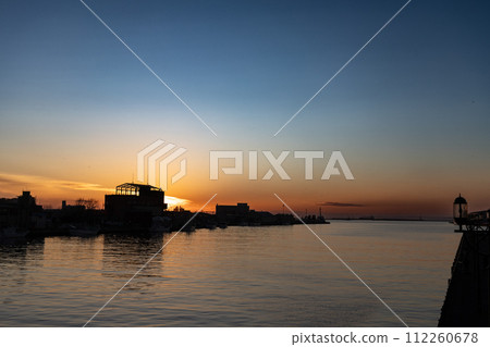 The world's three greatest sunset views: Kushiro Sunset from Nishumai Bridge 112260678