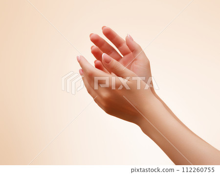 Hand skin care. Closeup of beautiful woman hands Hand skin care. Closeup of beautiful woman hands 112260755