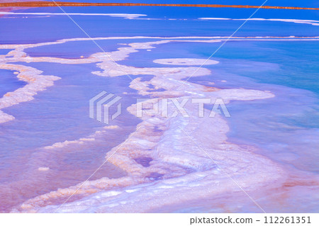 The texture of the salty shore of the Dead Sea. Nature background. gradient color The texture of the salty shore of the Dead Sea. Nature background. gradient color 112261351