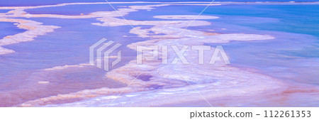 The texture of the salty shore of the Dead Sea. Nature background. gradient color 112261353