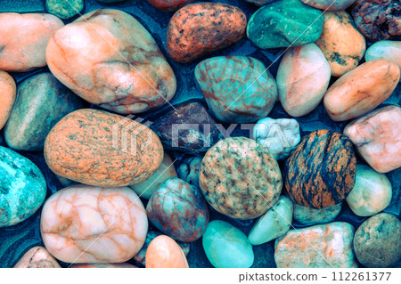 Colorful wet pebbles. Abstract nature pebbles background Colorful wet pebbles. Abstract nature pebbles background 112261377