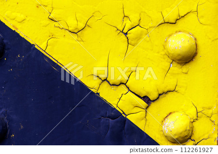 yellow paint on riveted steel frame yellow paint on riveted steel frame 112261927