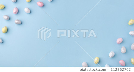 Easter frame of eggs painted in blue color. Easter frame of eggs painted in blue color. 112262762