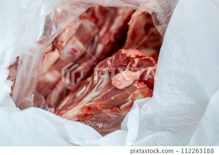 Bone and cartilage waste from butcher shops - dog food Bone and cartilage waste from butcher shops - dog food 112263188