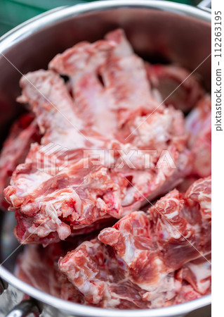 Bone and cartilage waste from butcher shops - dog food 112263195