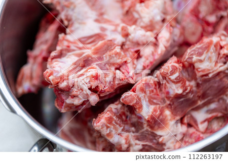 Bone and cartilage waste from butcher shops - dog food 112263197