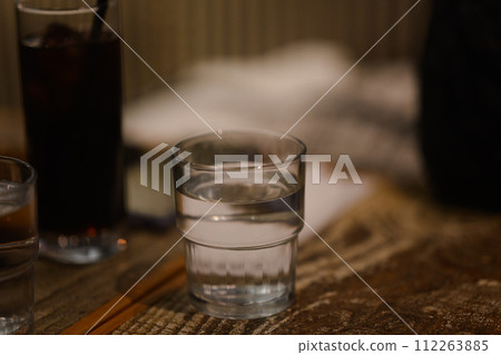 A glass of water served at a cafe 112263885