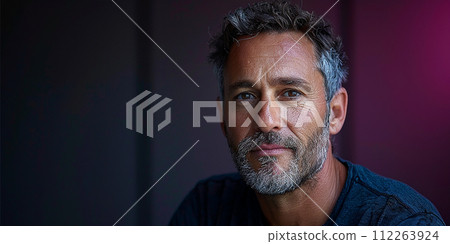 portrait of a handsome middle-aged man, 50 years old, with gray hair and a beard. 112263924