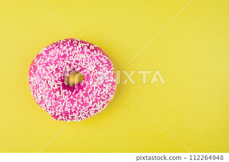 Pink donut on color background, flat lay, top view Pink donut on color background, flat lay, top view 112264948