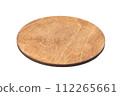 Wooden round brown tray top view. Wooden stand for hot. Isolated on a white background. Close-up. 112265661