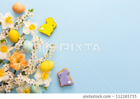 Spring flowers and Easter eggs and bunnies 112265735