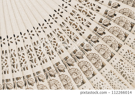 Traditional wooden hand fan, natural background Traditional wooden hand fan, natural background 112266014