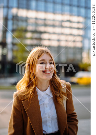 Portrait of a Happy White-Collar Worker in Formal Attire, Flash Photography Portrait of a Happy White-Collar Worker in Formal Attire, Flash Photography 112266188