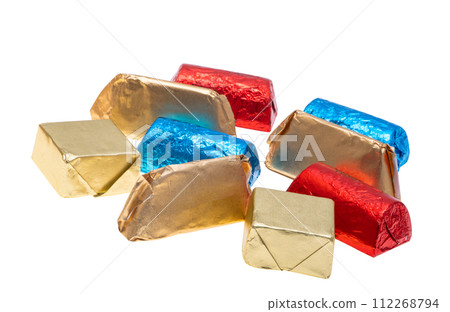 chocolate candies in foil isolated chocolate candies in foil isolated 112268794