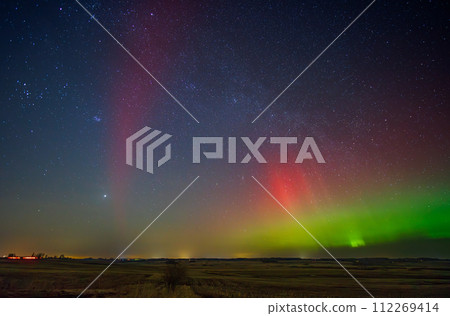 SAR arc - a phenomenon known as Stable Auroral Red arc. Panoramic photo. SAR arc - a phenomenon known as Stable Auroral Red arc. Panoramic photo. 112269414