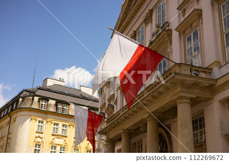 The flag of Bratislava consists of two horizontal stripes. Two Flags on building against blue sky The flag of Bratislava consists of two horizontal stripes. Two Flags on building against blue sky 112269672