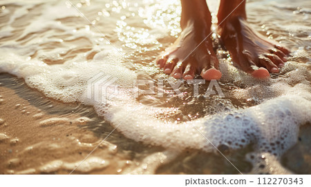 AI-generated content. Sunlight glistens on the sea foam that envelops bare feet on the sandy shore, evoking the gentle joy of the touch of the ocean. Calm by the sea 112270343